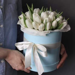 51 white tulips in a box